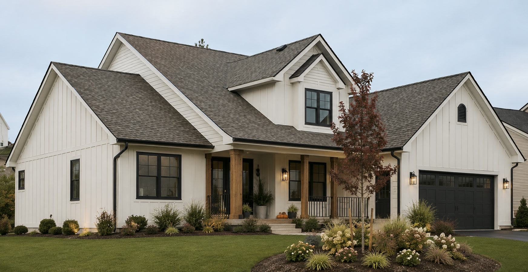 Modern Dallas–Fort Worth luxury home at dusk with black-framed replacement windows